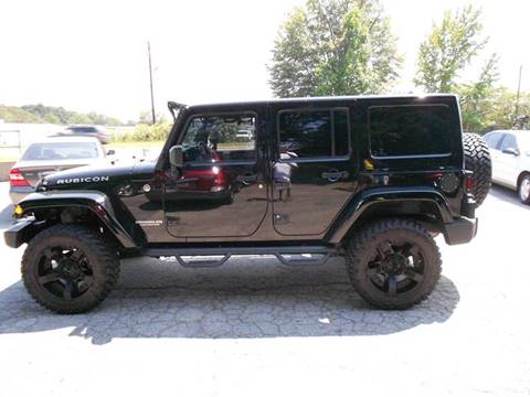 2012 Jeep Wrangler Unlimited for sale at FABULOUS AUTO SALES in Conyers GA