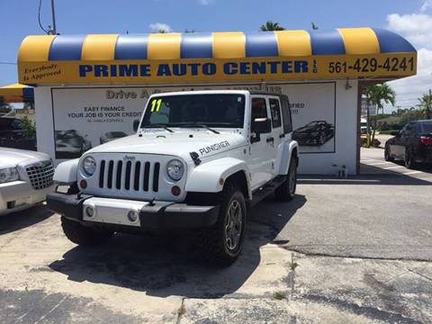 2011 Jeep Wrangler Unlimited for sale at PRIME AUTO CENTER in Palm Springs FL