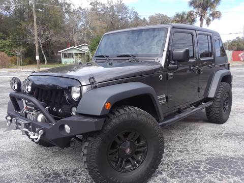 2014 Jeep Wrangler Unlimited for sale at LUXURY AUTO MALL in Tampa FL