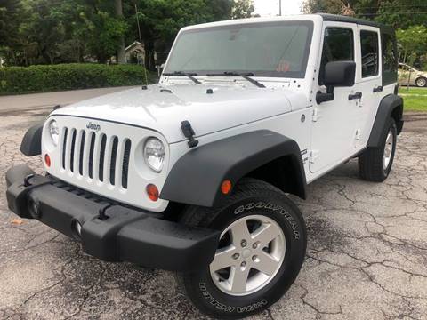2013 Jeep Wrangler Unlimited for sale at LUXURY AUTO MALL in Tampa FL