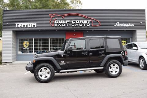 2009 Jeep Wrangler Unlimited for sale at Gulf Coast Exotic Auto in Biloxi MS