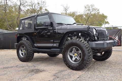 2015 Jeep Wrangler for sale at Gulf Coast Exotic Auto in Gulfport MS