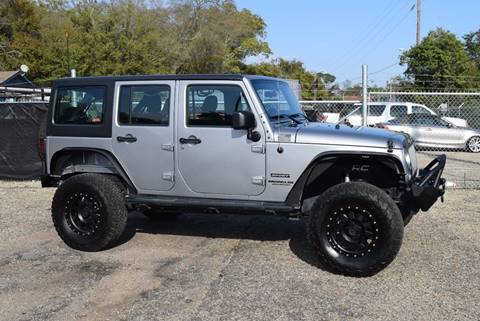 2016 Jeep Wrangler Unlimited for sale at Gulf Coast Exotic Auto in Biloxi MS