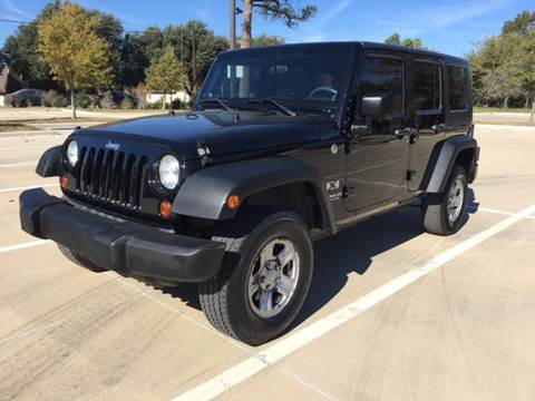 2009 Jeep Wrangler Unlimited for sale at Safe Trip Auto Sales in Dallas TX