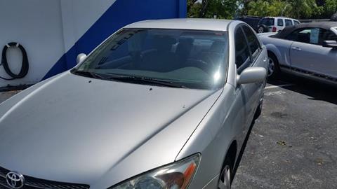 2002 Toyota Camry for sale at AUTO CARE CENTER in West Palm Beach FL