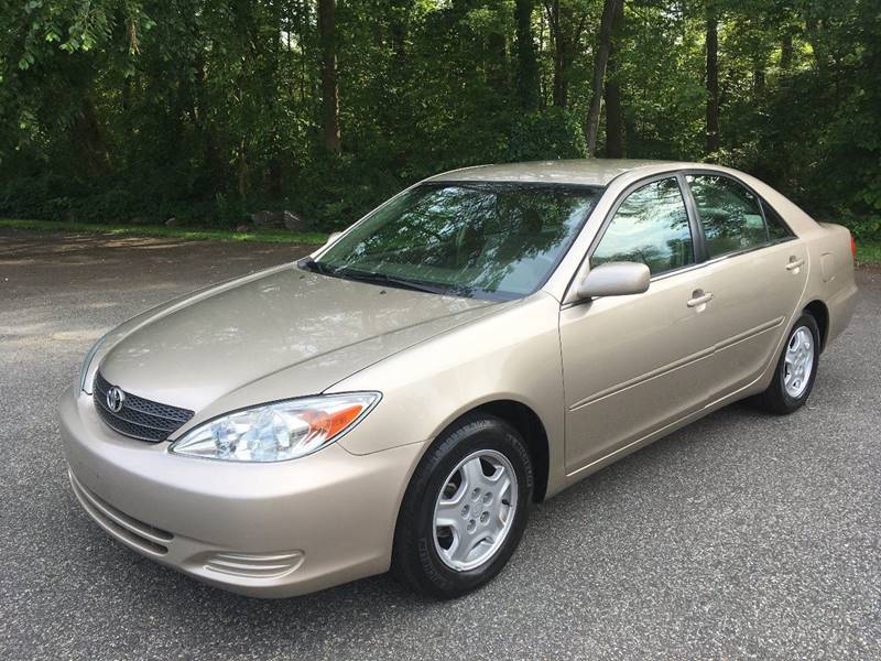 2002 Toyota Camry for sale at Lou Rivers Used Cars in Palmer MA