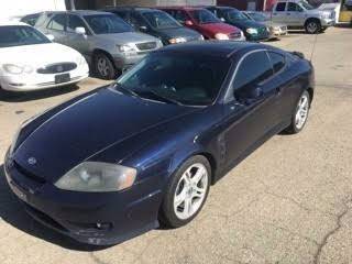 2005 Hyundai Tiburon for sale at RABI AUTO SALES LLC in Garden City ID