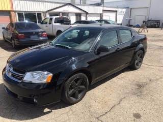 2013 Dodge Avenger for sale at RABI AUTO SALES LLC in Garden City ID