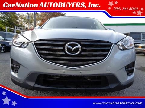 2016 Mazda CX-5 for sale at CarNation AUTOBUYERS Inc. in Rockville Centre NY