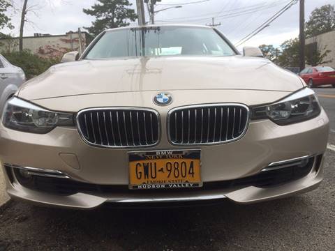 2013 BMW 3 Series for sale at CarNation AUTOBUYERS Inc. in Rockville Centre NY