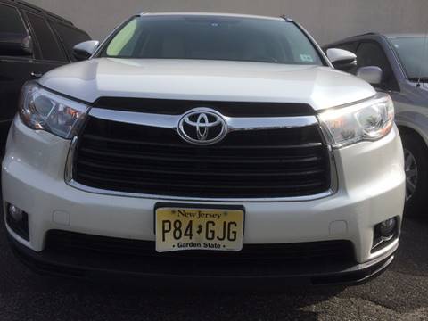 2015 Toyota Highlander for sale at CarNation AUTOBUYERS Inc. in Rockville Centre NY