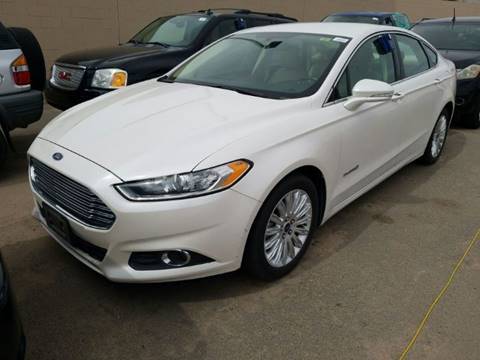 2014 Ford Fusion Hybrid for sale at RENEE'S AUTO WORLD in El Paso TX