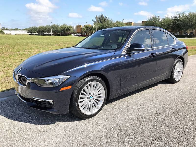 2015 BMW 3 Series for sale at DENMARK AUTO BROKERS in Riviera Beach FL
