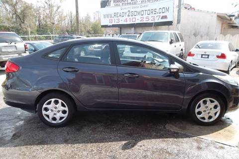 Used 2013 Ford Fiesta SE with VIN 3FADP4BJ2DM223692 for sale in Tampa, FL