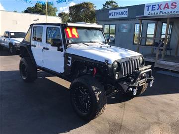 2014 Jeep Wrangler Unlimited for sale at Texas 1 Auto Finance in Kemah TX