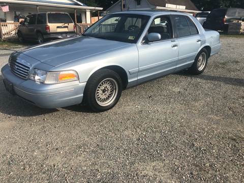 1999 Ford Crown Victoria for sale at ABED'S AUTO SALES in Halifax VA