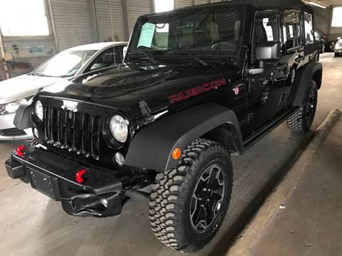 2016 Jeep Wrangler Unlimited for sale at FAST LANE AUTO SALES in San Antonio TX