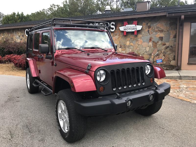 2011 Jeep Wrangler Unlimited for sale at Classy And Luxury Motors in Marietta GA