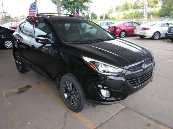 2014 Hyundai Tucson for sale at Divine Auto Sales LLC in Omaha NE