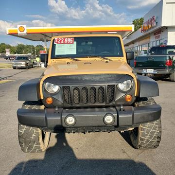 2013 Jeep Wrangler Unlimited for sale at Dixie Motors Inc. in Northport AL