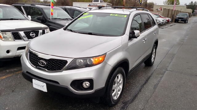 2011 Kia Sorento for sale at Howe's Auto Sales in Lowell MA