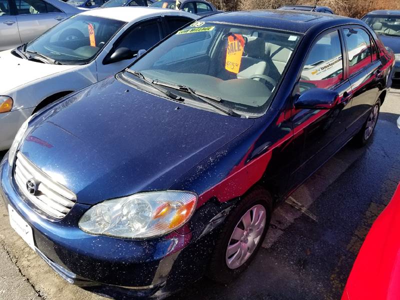 2003 Toyota Corolla for sale at Howe's Auto Sales in Lowell MA