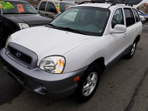 2004 Hyundai Santa Fe for sale at Howe's Auto Sales in Lowell MA