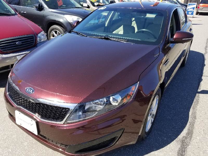 2011 Kia Optima for sale at Howe's Auto Sales in Lowell MA