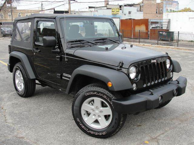 2014 Jeep Wrangler for sale at OUTBACK AUTO SALES INC in Chicago IL