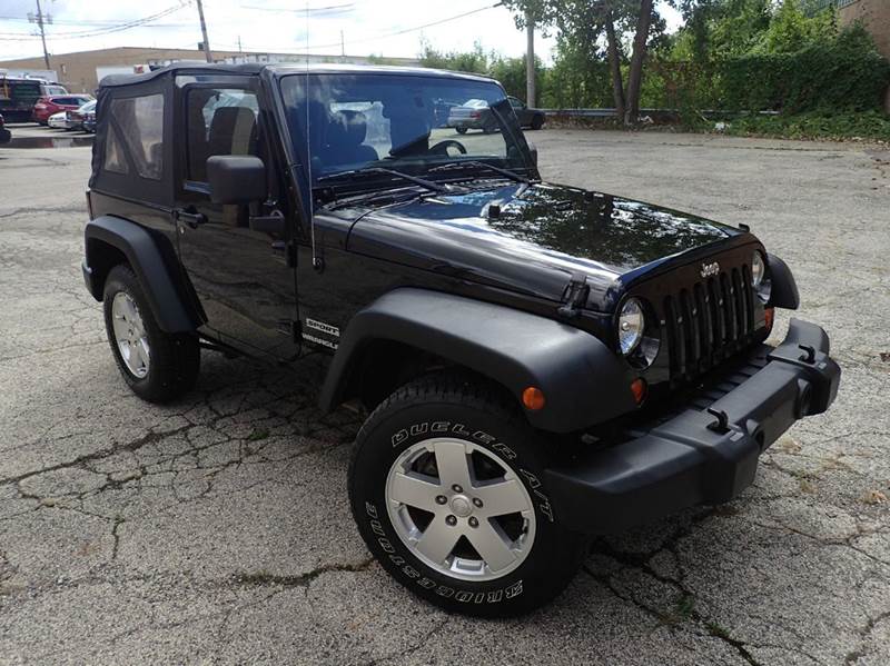 2012 Jeep Wrangler for sale at OUTBACK AUTO SALES INC in Chicago IL
