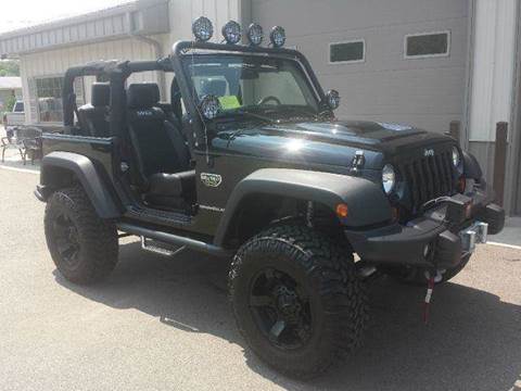 2012 Jeep Wrangler for sale at Route 106 Motors in East Bridgewater MA