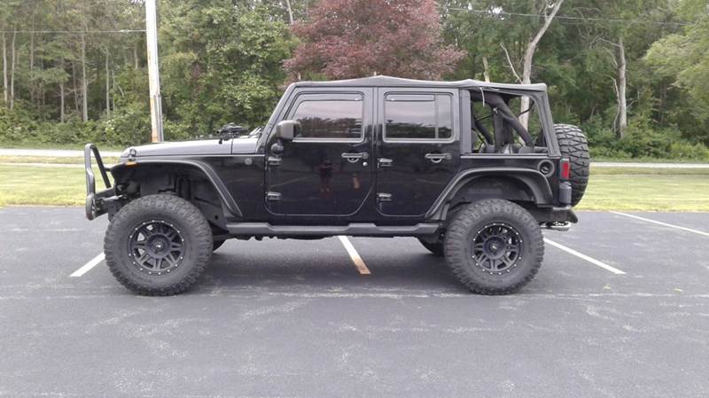 2011 Jeep Wrangler Unlimited for sale at Route 106 Motors in East Bridgewater MA