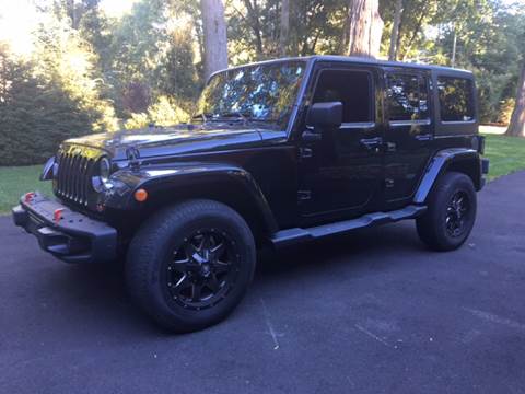 2012 Jeep Wrangler Unlimited for sale at Village Auto Sales in Milford CT
