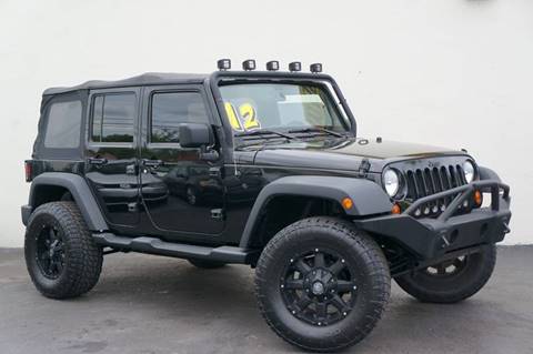 2012 Jeep Wrangler Unlimited for sale at Prado Auto Sales in Miami FL