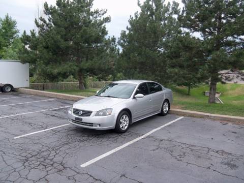 2005 Nissan Altima for sale at QUEST MOTORS in Englewood CO