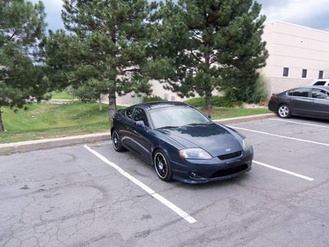 2005 Hyundai Tiburon for sale at QUEST MOTORS in Englewood CO
