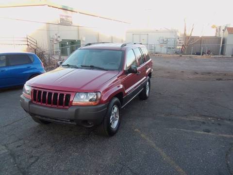 2004 Jeep Grand Cherokee for sale at QUEST MOTORS in Englewood CO