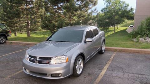 2013 Dodge Avenger for sale at QUEST MOTORS in Englewood CO