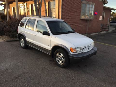 2002 Kia Sportage for sale at QUEST MOTORS in Englewood CO