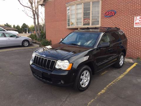 2009 Jeep Grand Cherokee for sale at QUEST MOTORS in Englewood CO