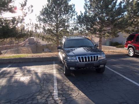 2002 Jeep Grand Cherokee for sale at QUEST MOTORS in Englewood CO