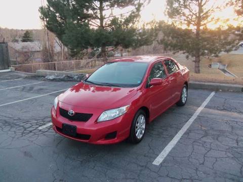2010 Toyota Corolla for sale at QUEST MOTORS in Englewood CO