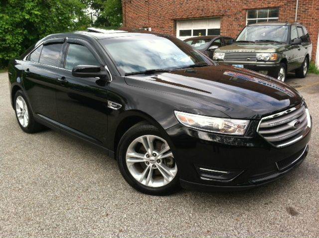2013 Ford Taurus for sale at Rusak Motors LTD. in Cleveland OH