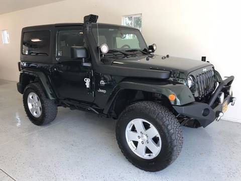 2011 Jeep Wrangler for sale at The Fine Auto Store in Imperial Beach CA