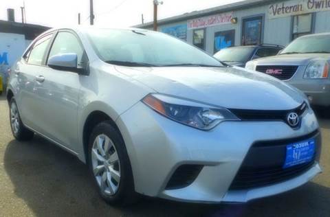 2014 Toyota Corolla for sale at Unlimited Motors, LLC in Denver CO