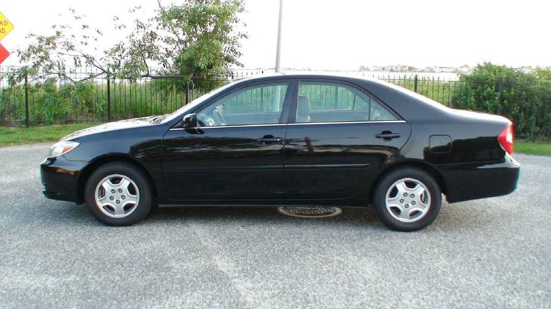 2003 Toyota Camry for sale at ACTION WHOLESALERS in Copiague NY