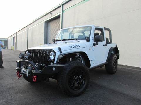 2015 Jeep Wrangler for sale at VA Leasing Corporation in Doral FL