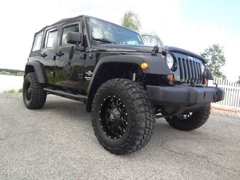 2012 Jeep Wrangler Unlimited for sale at Specialty Motors LLC in Land O Lakes FL
