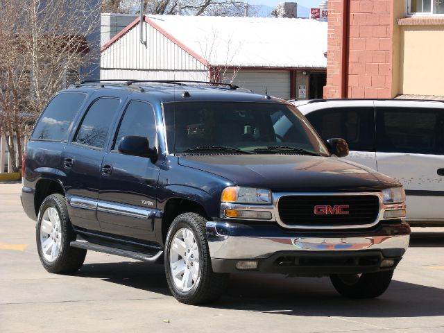 2004 GMC Yukon for sale at THE MANHATTAN AUTO GROUP in Lakewood CO