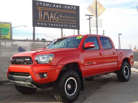 2015 Toyota Tacoma for sale at THE MANHATTAN AUTO GROUP in Lakewood CO